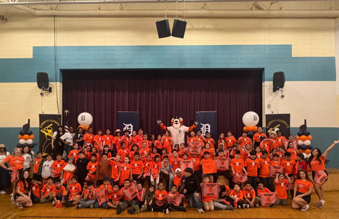 all 3rd-5th graders with perfect attendance posing in front of the stage